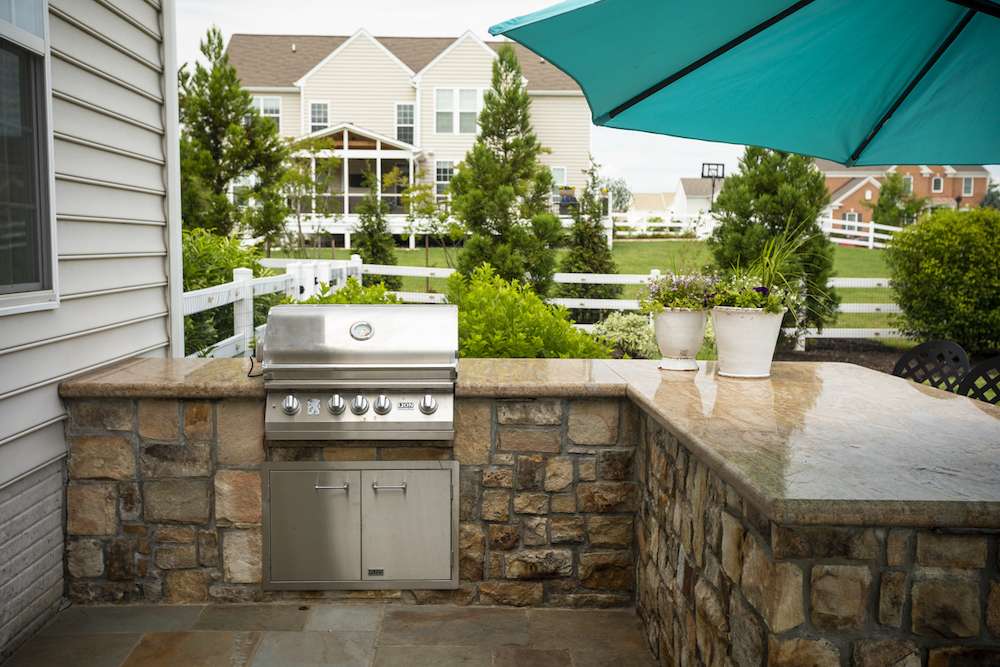 outdoor-kitchen-with-landscape-trees
