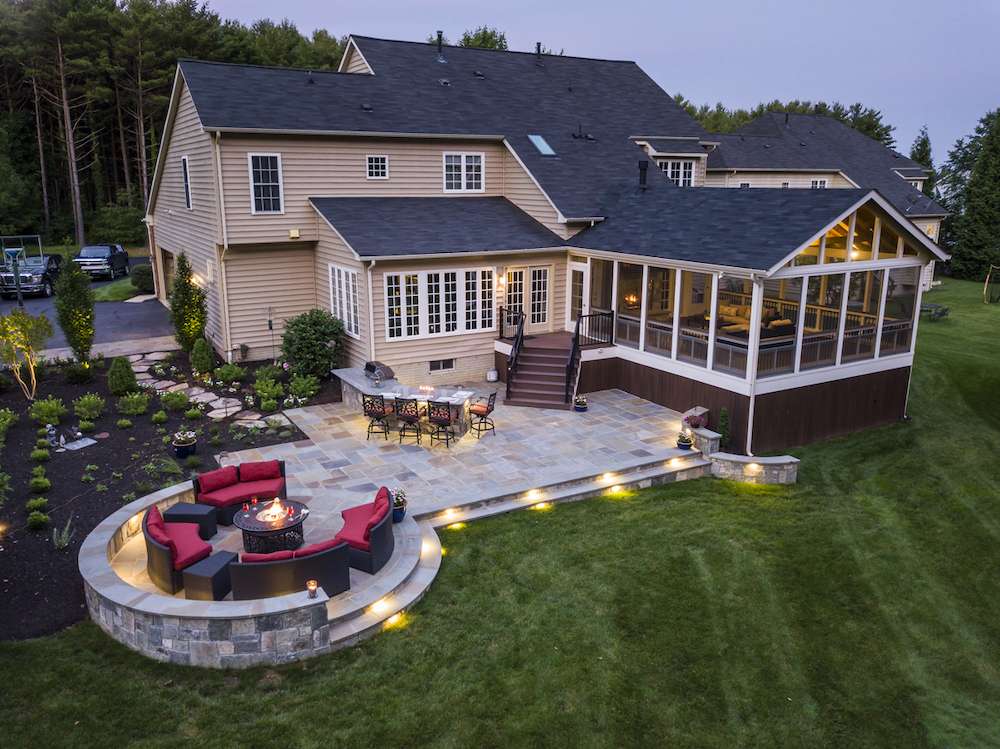 Aerial view of patio, deck, and backyard