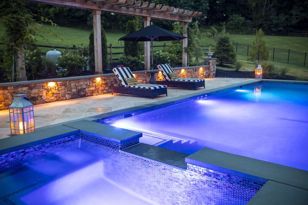 Pool and spa with blue lighting 