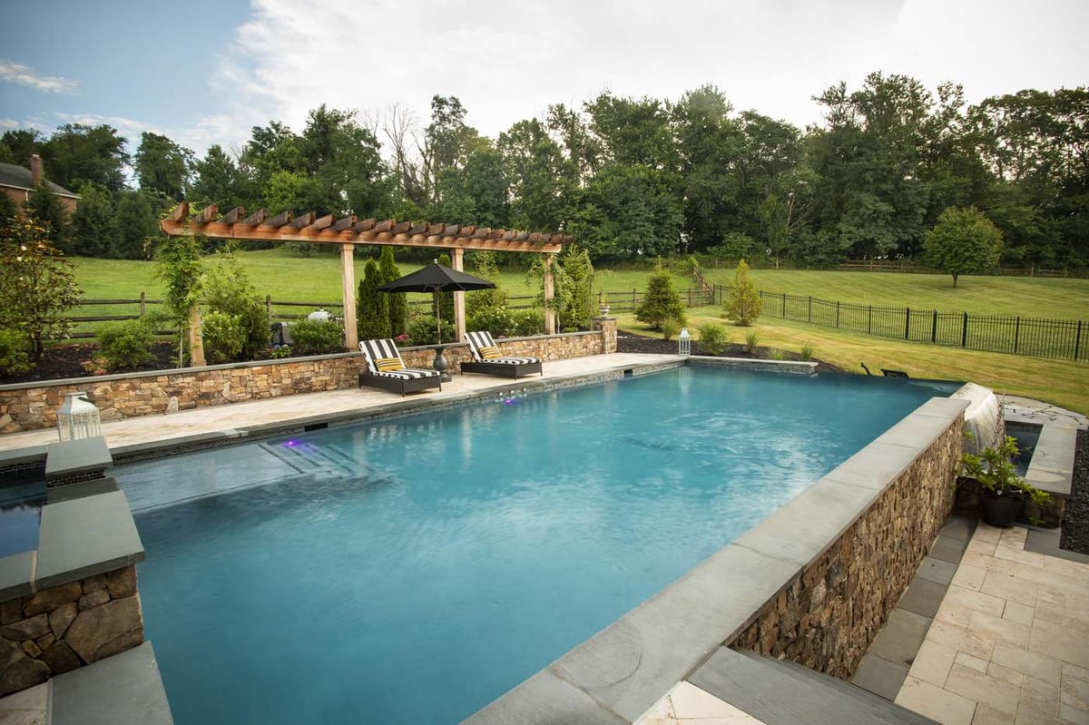 pool with infinity edge and pergola