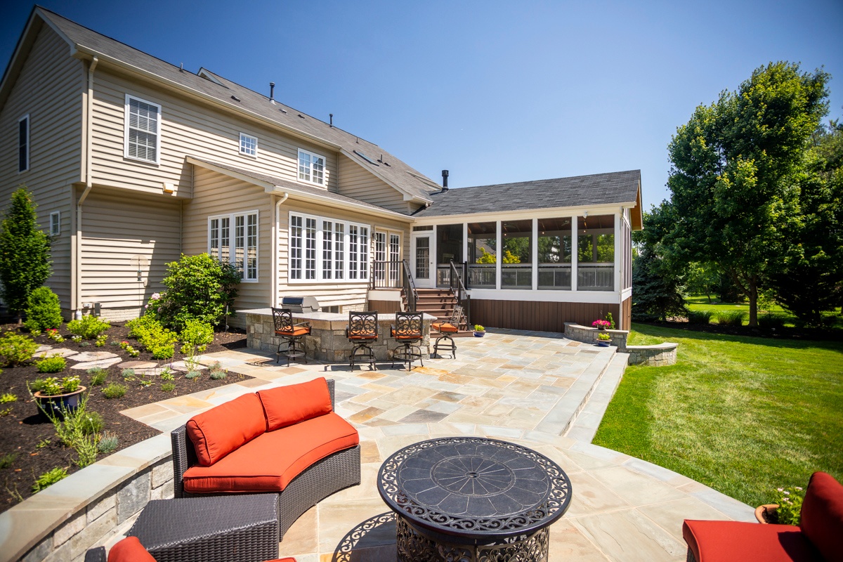 patio with fire pit and large porch