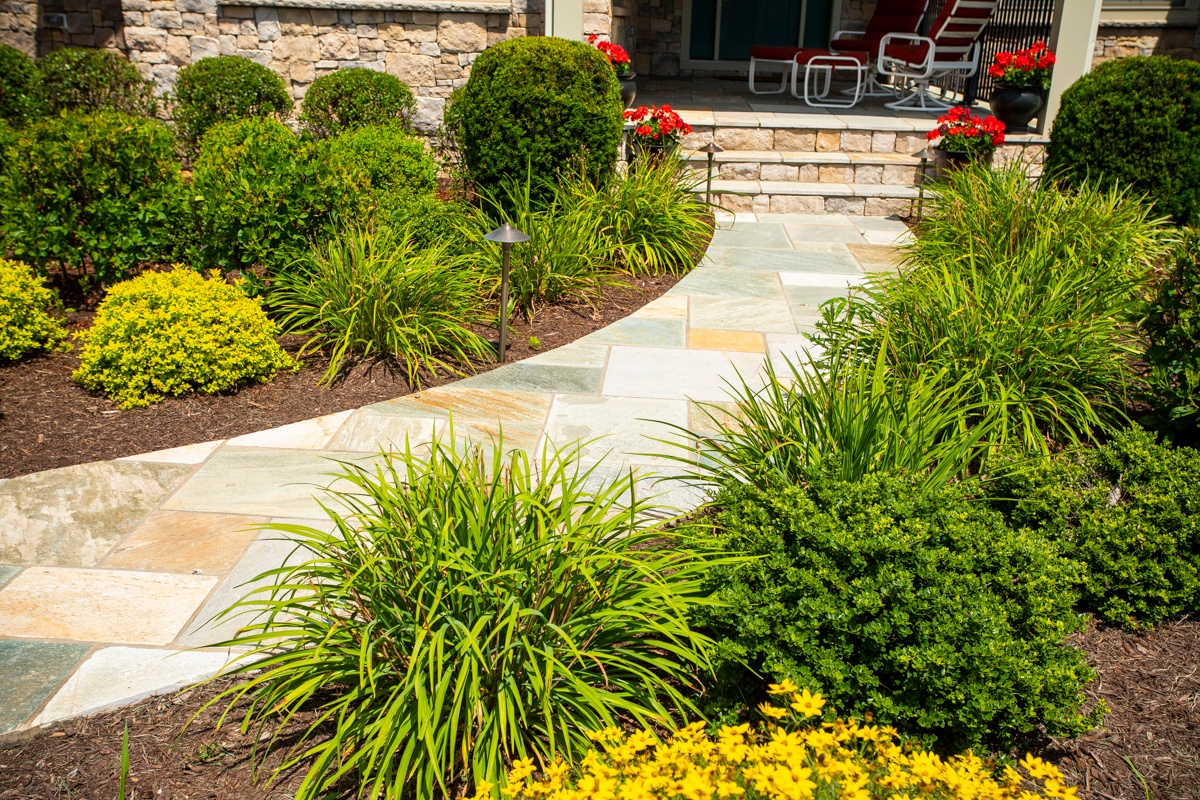 landscped walkway with natural stone